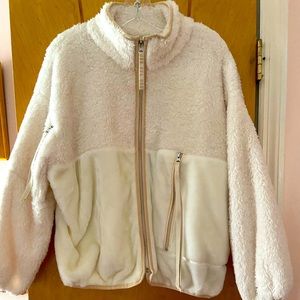 UGG lightweight cream colored fuzzy oversized jacket with zipper trim